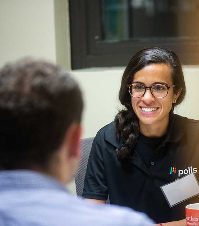 An employer speaks with a Khoury College student at a recruiting event