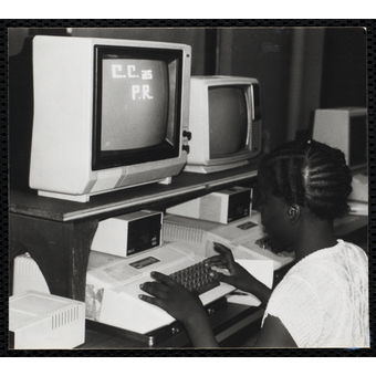 An undergraduate works in a Northeastern lab during the 1970s
