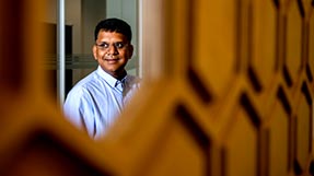 Auroop Ganguly, professor of civil and environmental engineering at Northeastern University, says that climate change adaptation is as important as reducing greenhouse gas emissions. Photo by Matthew Modoono/Northeastern University