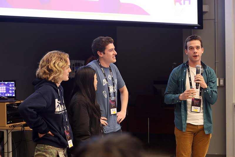 The team speaks during the event
