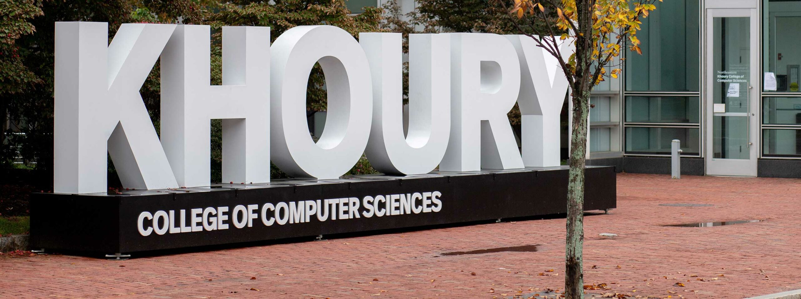 A Khoury College of Computer Science sign on the Boston campus