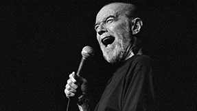 “George Carlin: I’m Glad I’m Dead” is an AI-generated standup special from the late comedian. AI experts say it raises fundamental questions about the purpose of how AI is being used in the arts. (Photo by Mark Junge/Getty Images)