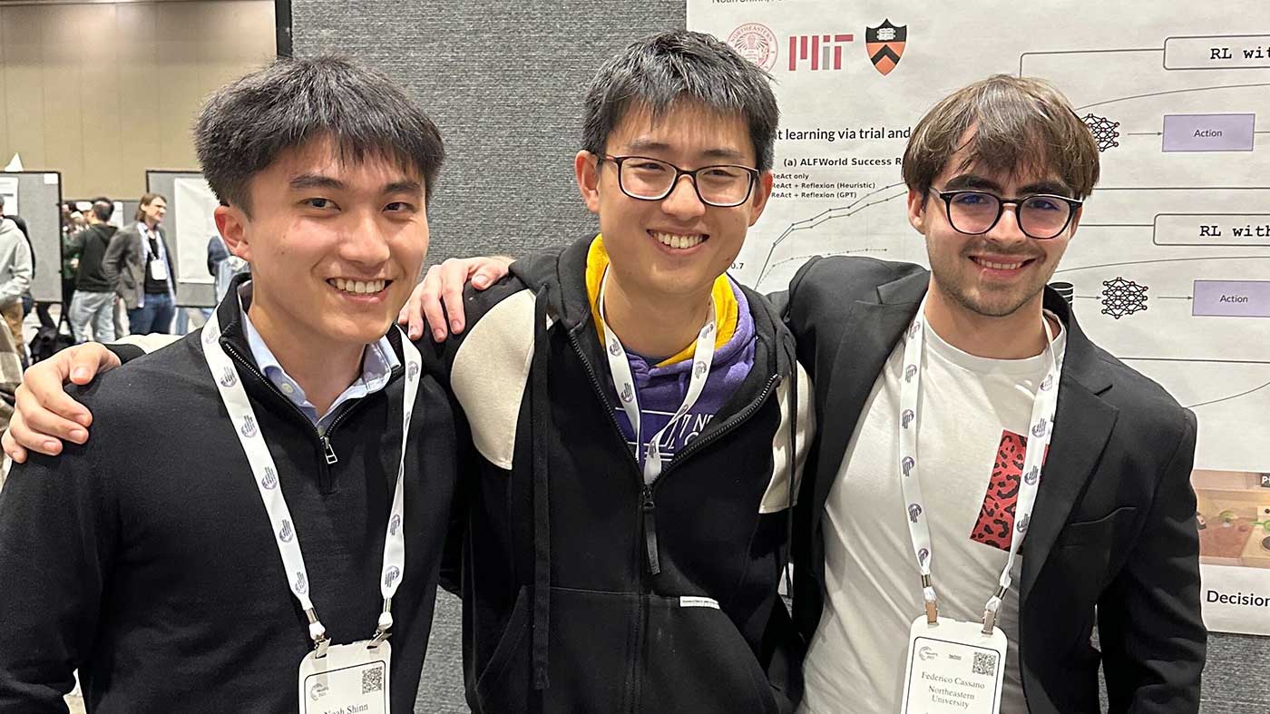 Khoury undergrads Noah Shinn (left) and Federico Cassano (right), with Princeton doctoral student Shunyu Yao.
