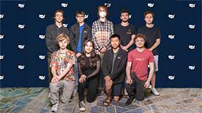 Nine members of Northeastern University’s Collegiate Cyber Defense Competition team pose for a photo at the competition.