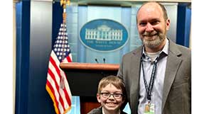 Alan Mislove and his son in the White House press briefing room